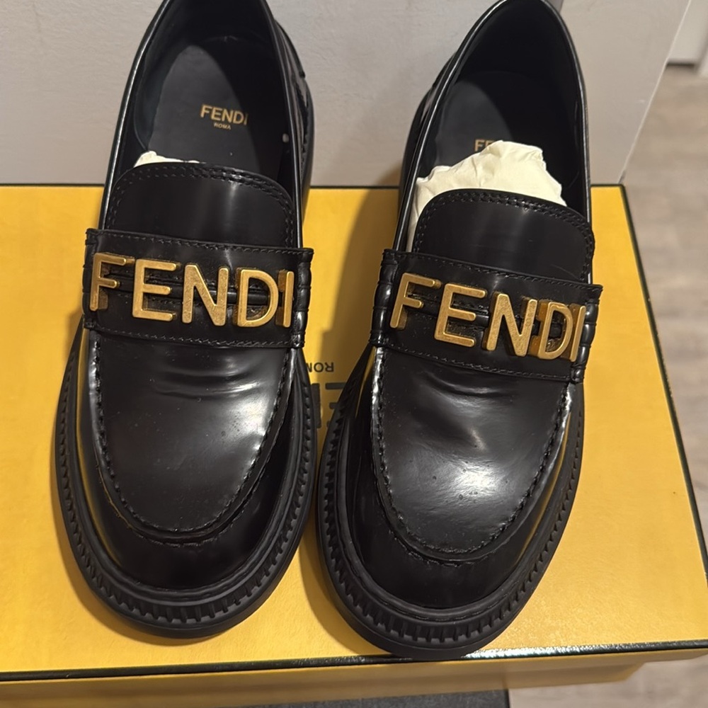Fendi Loafers-Black with Gold Logo
Bold Fendi logo, durable sole, sleek